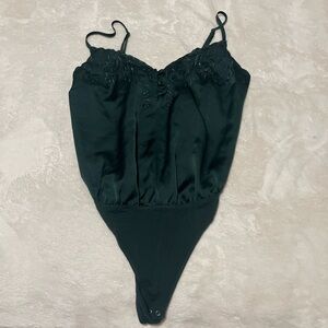 Elegant green bodysuit
